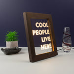 Funny framed artwork LED sign. Cool people live here. Light up typography graphic design