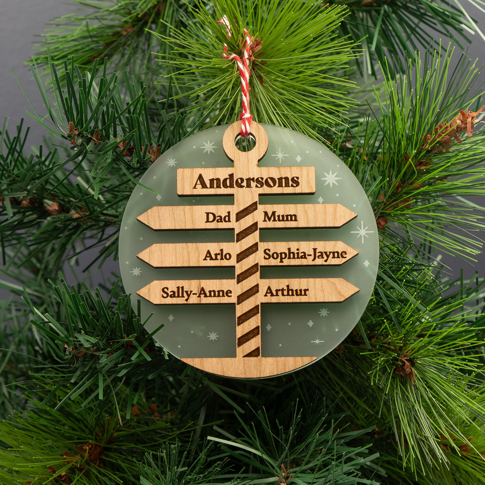 Personalised North pole Christmas tree hanging decoration. Family name Xmas keep sake.