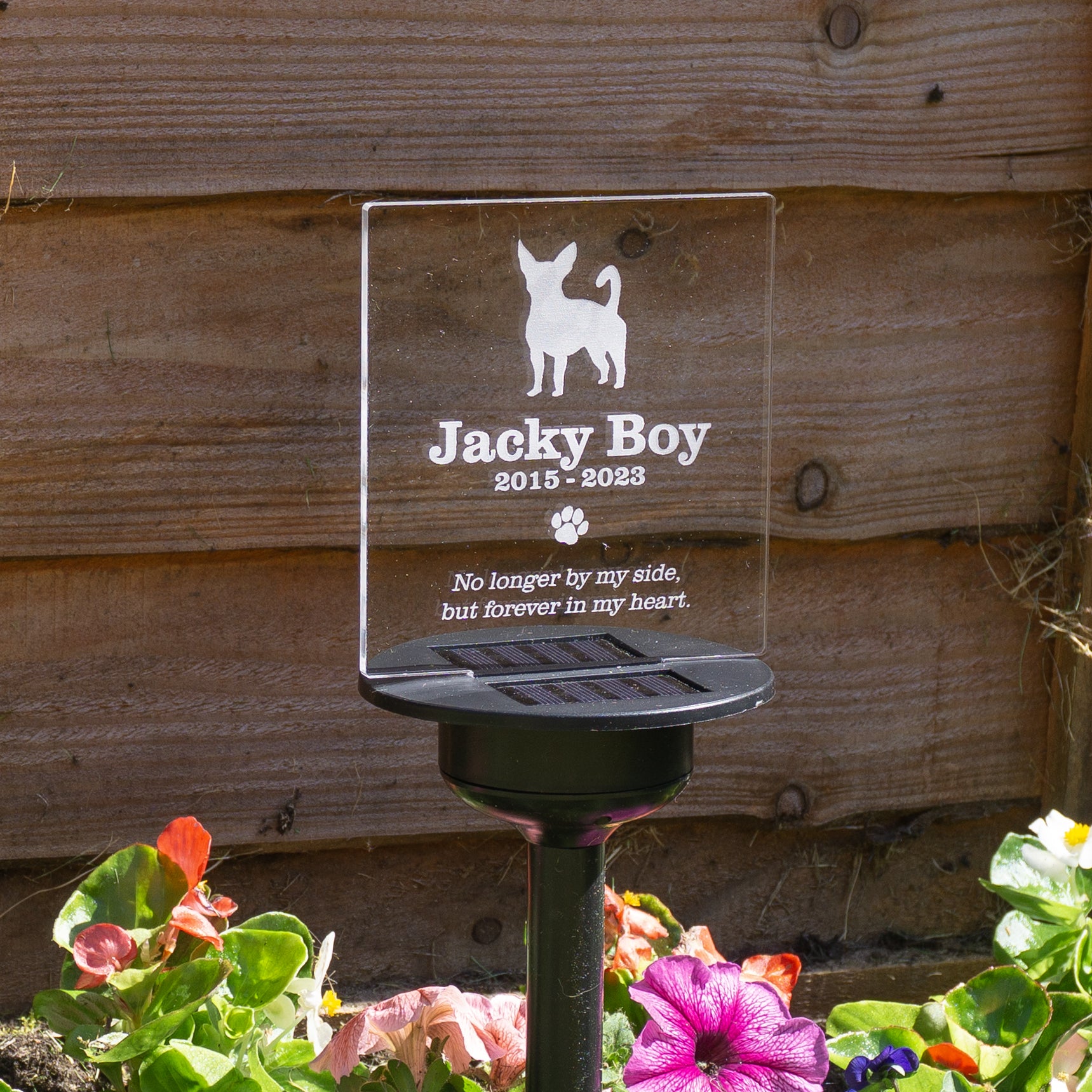 Personalised dog memorial light up graveside plaque. Outdoor solar powered LED sign