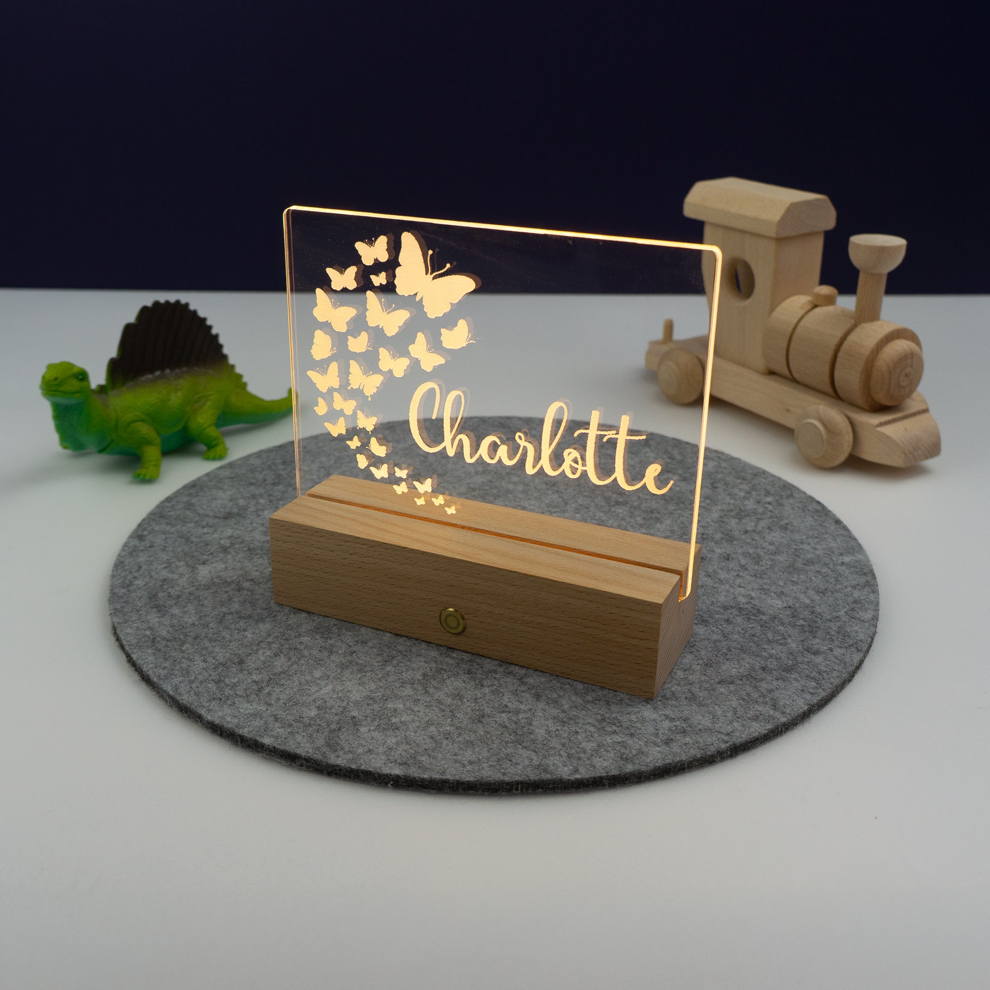 Personalised butterfly bedroom night light. Small neon name sign