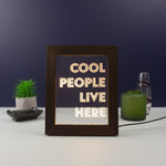 Funny framed artwork LED sign. Cool people live here. Light up typography graphic design