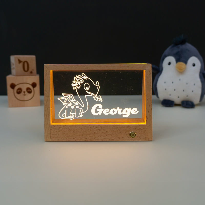 Personalised rechargeable dinosaur LED name plaque.