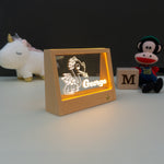 Personalised rechargeable dinosaur LED name plaque.