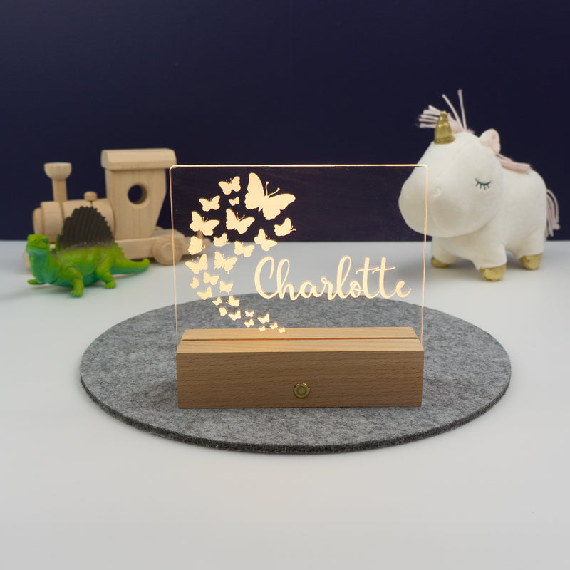 Personalised butterfly bedroom night light. Small neon name sign