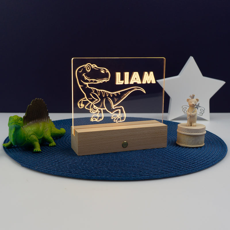 Personalised child's dinosaur LED name plaque. Light up bedroom sign