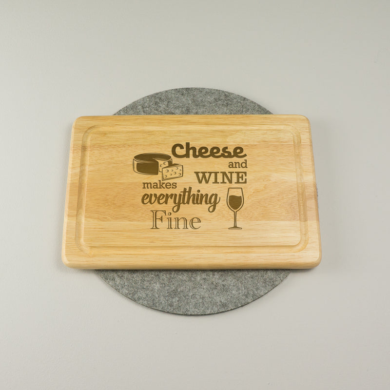 Cheese and wine makes everything fine chopping board