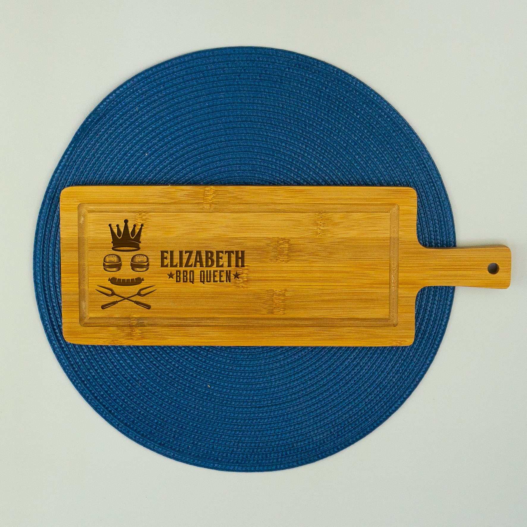 Personalised bamboo BBQ Queen serving platter. Long paddle chopping serving board